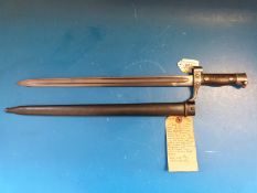 A French M92 Sabre bayonet with 1915 modified guillon, blade length 39.