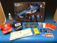 Two Formua 1 caps, a freestanding promotional picture, key rings, driver's gloves, paddock panses,