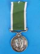 A Rhodesian Prison Service 1965 -1968 Medal awarded to 6571 Warder Chenjerai