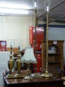 Two brass standard lamps, one in the form of a column,