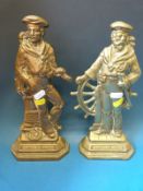 A Britain's Pride bronze sailor doorstop together with a similar brass example (height 29cm)