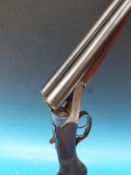 A Ward & Sons 12 bore side by side shotgun, serial number 047.