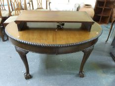 A 19thC oval mahogany dining table with additional leaf, rope twist edge and cabriole legs,