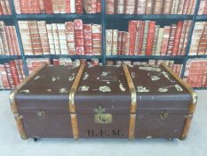 An ash bound steamer trunk with original Canadian Pacific label and one other trunk