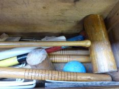 An ash croquet set in wooden case