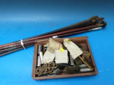 A gun cleaning kit for 12-bore shotguns together with a quantity of cleaning rods