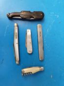 A hallmarked silver folding knife with three blades,