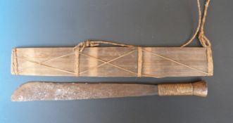 A Naga Indian / Burmese tribal machete with woven handle and wooden sheath