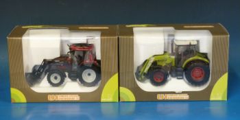 Two Universal Hobbies 1:32 scale diecast model tractors,