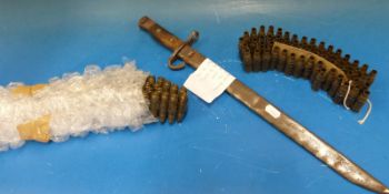 A late 19thC bayonet and a quantity of spent ammunition