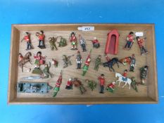 Thirty Britains and other model lead soldiers to include Cavalry Highland Regiments etc together