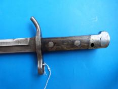 A c1927 Finnish bayonet with round quillon-like crossguard, no scabbard, 30.