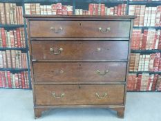 A Georgian oak chest of four graduated drawers raised on bracket feet (W98 x D53 x H103cm)