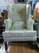 A wingback armchair in the Georgian style