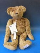 A Steiff classic teddy bear with cocked feet and wrists,