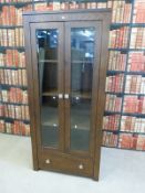 A modern glazed bookcase with drawer under (W87 x D45 x L190cm)