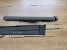 A Guideline 'Exceed' four piece nine feet five weight carbon fibre fly rod (in original case)