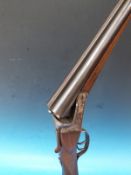 A Spanish 12 bore side by side shotgun, serial number 11977.