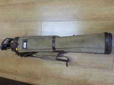 A vintage golf bag with clubs marked 'special', J.