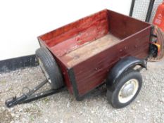 A small two-wheeled car trailer
