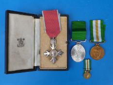 Rhodesian cased MBE group of three medals awarded to Chief Sigola who was a member of the Council