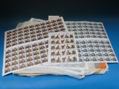 A collection of approximately 38 mint sheets of GB QEII stamps,