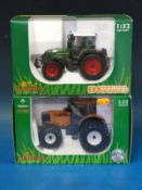 Two Universal Hobbies Country Collection 1:32 scale diecast model tractors,