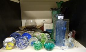 A collection of glass to include eight vases, 14 paperweights, Caithness, Mdina,