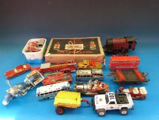 A Hornby 0 gauge clockwork locomotive and wagon,