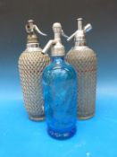 Three soda siphons including a blue glass 'Stanfields,