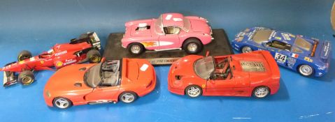 Twenty-two mainly Burago and Maistro 1:18 scale diecast model vehicles