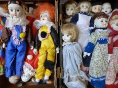 Sixteen porcelain-headed dolls,
