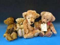 Four various teddy bears