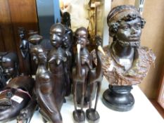 A bust of an African chief together with a collection of other African items,