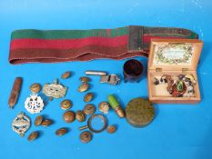 A quantity of small military items including RAF badge and buttons,