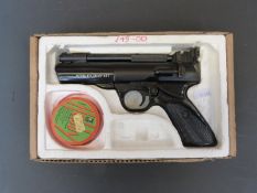 A Webley Tempest air pistol in original box