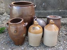A collection of jars and flagons to include Dursley and Cheltenham etc