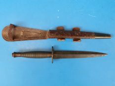 A Fairbairn Sykes WW2 fighting dagger in original sheath