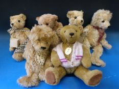 Six various artist's bears including two evacuee bears