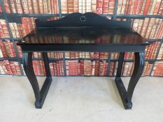 An ebonised hall table (W11 x D60 x H101cm)