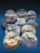 A set of ten Doulton /Coalport wall plates with scenes of war planes (boxed with certificates)