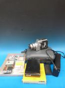 A boxed JVC Super VHS video movie camera, further vintage movie cameras, projector,