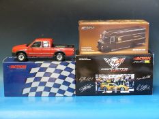 Three Action Collectables diecast model vehicles,
