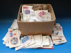 A box of mixed GB / Commonwealth stamps,