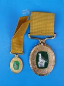 A Rhodesia Badge of Honour awarded to D Chimangah with miniature