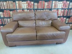 A brown leather two seat sofa (length 184cm)