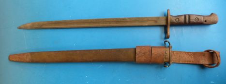 A 1917 US bayonet marked to blade with W, 1917 and US,