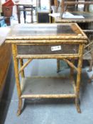 A bamboo and lacquer fold-over card table (H79 x W63 x D42cm)