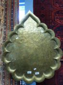 A shaped brass Indian tray