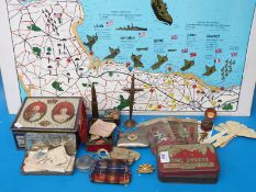 A quantity of militaria and ephemera including Armentieres trench art cross, Blackpool purse,